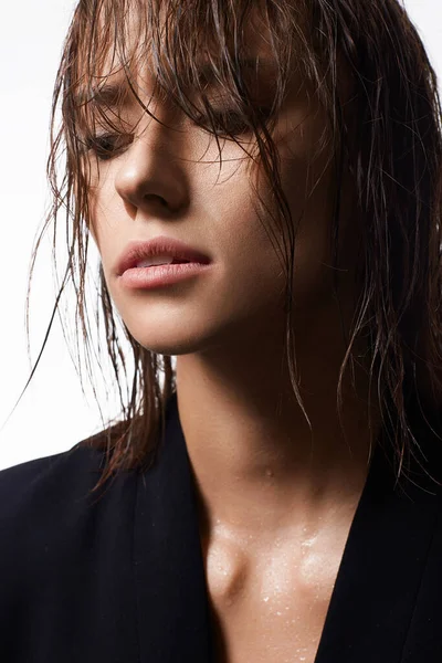 beautiful girl with wet hair. young woman close-up portrait
