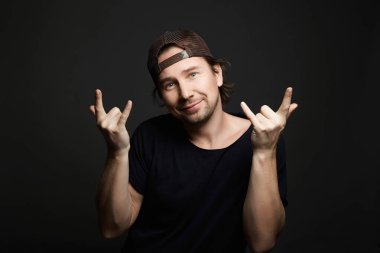 Smiling young Man in Hat. Happy Fanny Boy portrait. Smiling Dude