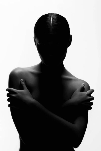 Nude Woman silhouette. Beautiful Naked Body Girl. Isolated Portrait