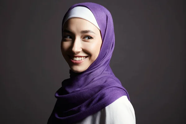 beautiful smiling islamic young woman with Make-up. beauty Happy girl in hijab. fashion oriental style model. Asian face