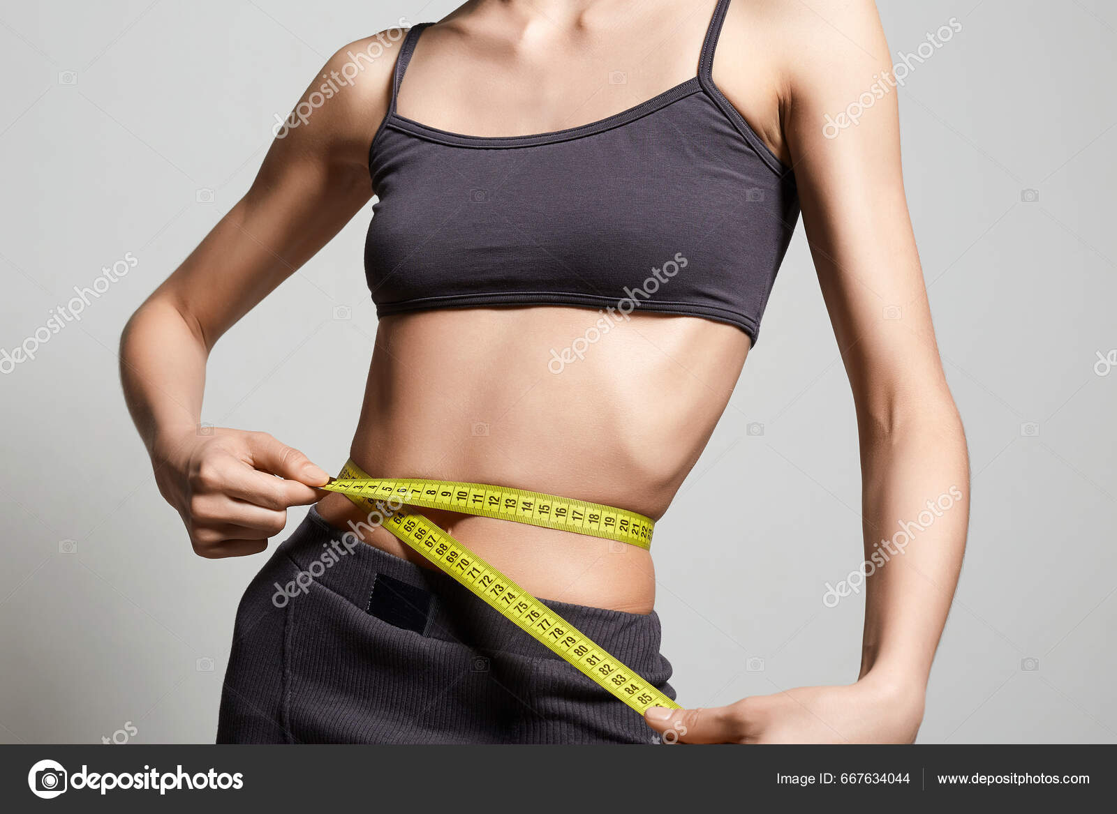 Measuring tape on girl's body Stock Photo by ©VelesStudio 117384564