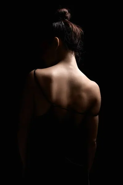 stock image Woman silhouette. Beautiful Naked Back Girl. Sexual posing model in dark