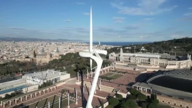 Barcelona Catalonia, Spain, January 2023 Aerial view of Torre De Calatrava in Barcelona. Torre De Calatrava also known as Torre Telefonica is a telecommunication tower in the Montjuic. High quality 4k