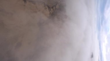 Dynamic Aerial fpv shot falling from the cloud at Bardenas Reales desert in southeast Navarre, Spain. High quality 4k footage