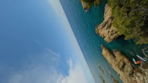 Vertically Orientated Dynamic Fpv Shot Cliff Catching Guy Jumping Water — Video