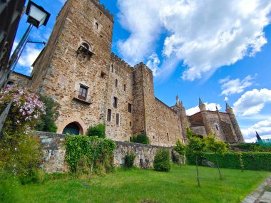 Monastery of Guadalupe in Caceres province in a cloudy day. Its gothic style.