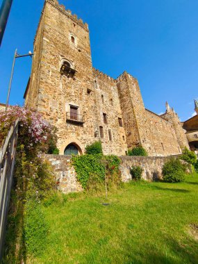 Monastery of Guadalupe in Caceres province in a cloudy day. Its gothic style.