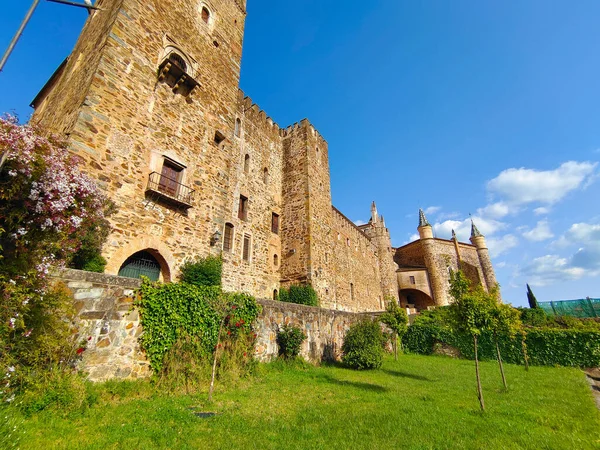 Monastery of Guadalupe in Caceres province in a cloudy day. Its gothic style.