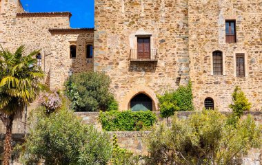 Monastery of Guadalupe in Caceres province in a cloudy day. Its gothic style.