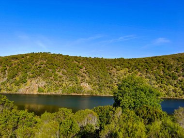 Tagus river in Caceres in the center of Spain in a spring day.