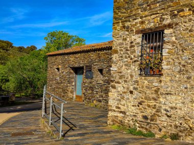 Street of San Carlos de Alcantara in the center of Spain in a sunny day