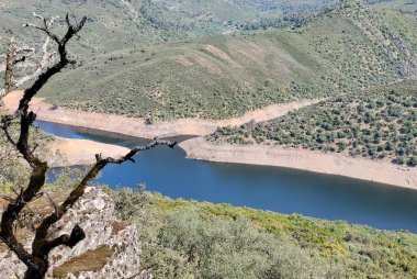 Tagus river in Caceres in the center of Spain in a spring day.