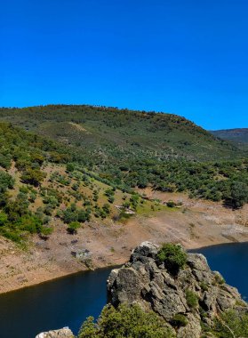 Tagus river in Caceres in the center of Spain in a spring day.