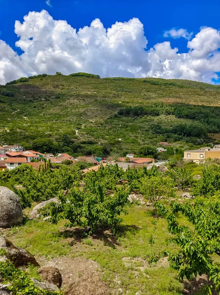 Houses in nature of Cabezuela del Valle in Extremadura in the center of Spain in a cloudy day