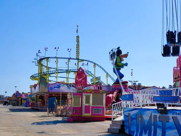 stock image Jerez de la Frontera, Spain - May 2023. Fair with attractions for children in a summer day.