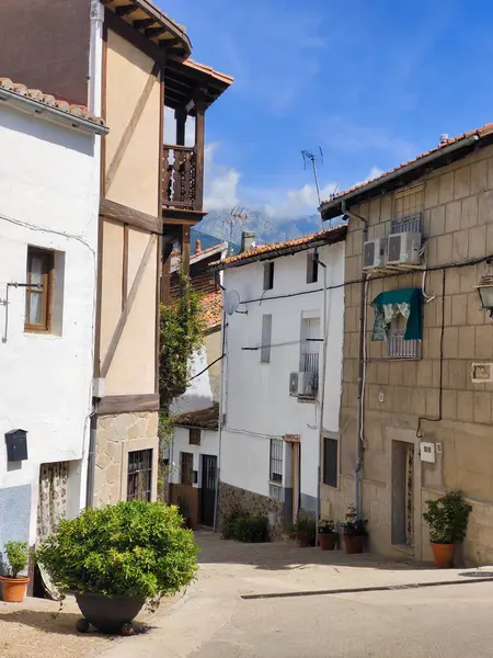 stock image Spanish village with flowers in the street in a sunny day