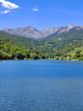 Lake in the center of Spain in a sunny day clipart