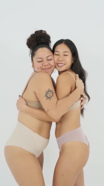 Static Shot Glad Size Woman Underwear Smiling Hugging Asian Girlfriends — Stock Video