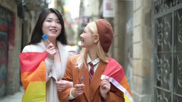Slow Motion Video Asian Lesbian Couple Wrapped Rainbow Lgbt Flag — Wideo stockowe