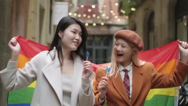 Slow Motion Video Asian Lesbian Couple Waving Rainbow Lgbt Flag — Stockvideo