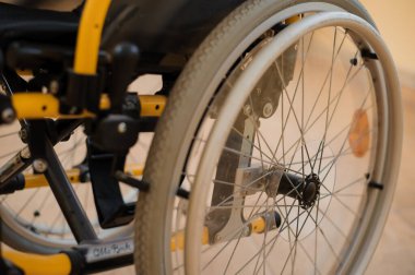 Children's wheelchair. Empty wheelchair in the hospital