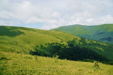 Summer mountain landscape, forest, clouds. Mount Gemba Pylypets Ukraine. Ukrainian mountains Carpathians, Transcarpathia