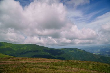 Summer mountain landscape, forest, clouds. Mount Gemba Pylypets Ukraine. Ukrainian mountains Carpathians, Transcarpathia
