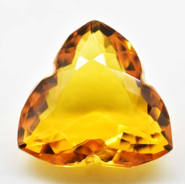 Natural gem yellow citrine on gray background