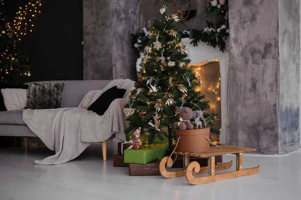 New Year\'s room interior decor, Christmas tree and fireplace in the background