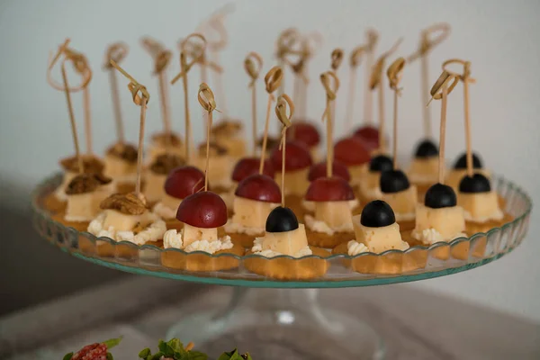 stock image Canapes with ham, cheese, cucumber and olives