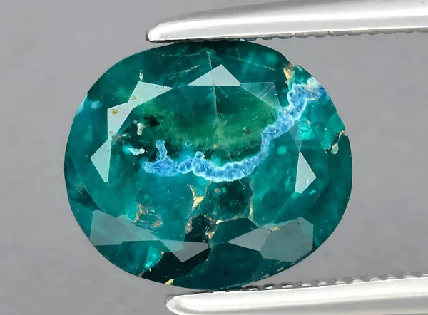 natural green dioptase gem on background