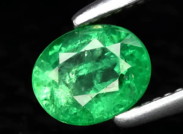 natural green tsavorite garnet gem on background