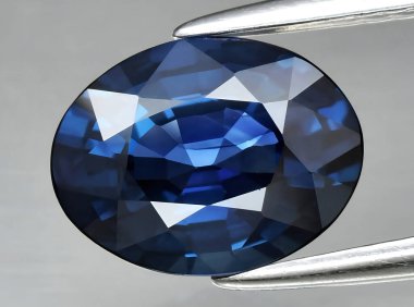 Arka planda doğal mavi safir taşı