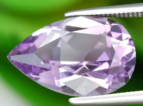 natural purple amethyst gem on background