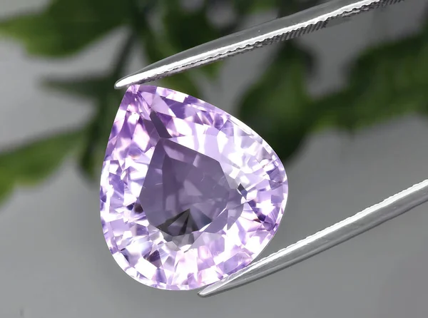 natural purple amethyst gem on background