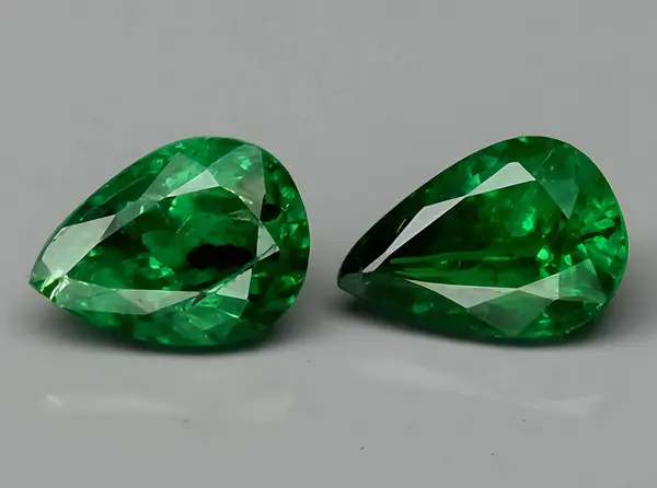 natural green tsavorite garnet gem on background