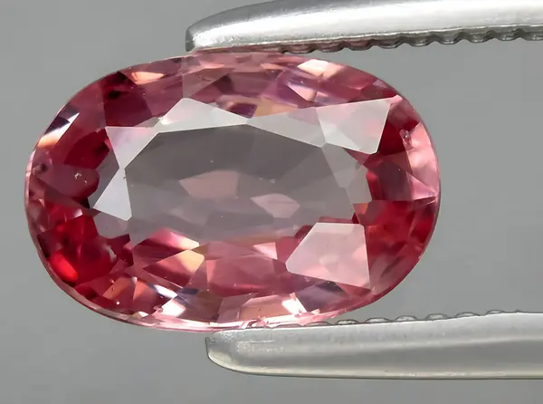 natural pink tourmaline gem on background