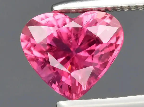 natural pink tourmaline gem on background