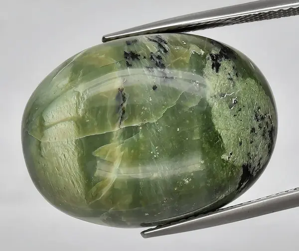natural green opal gem on background