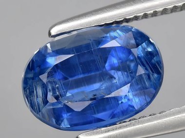 natural blue kyanite gemstone on background clipart