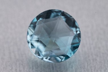 natural blue topaz gem on isolated white background clipart