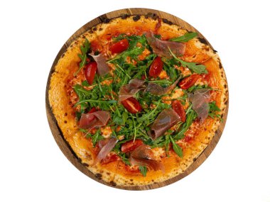 Taze Arugula ve tahta tahtada Prosciutto ile İtalyan Pizzası.