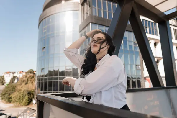 stock image Elegant Urban Fashion Portrait against Modern Architecture.