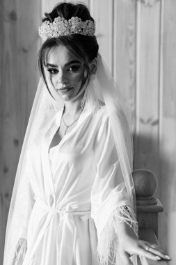 Elegant Black and White Portrait of a Bride in Luxurious Attire. clipart