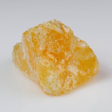 Temiz Yüzeyde Parlak Sarı Kalsit Mineral Numunesi.