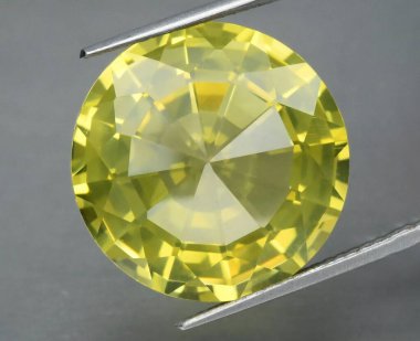 Radiant Yellow Topaz Gemstone with Brilliant Faceting Displaying Intricate Sparkles. clipart