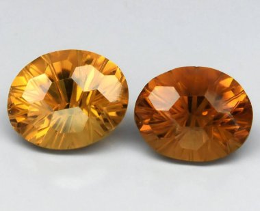 Göz kamaştırıcı Citrine Gemstone 'lar Canlı Altın Renkler ve Parlak Yüzler.