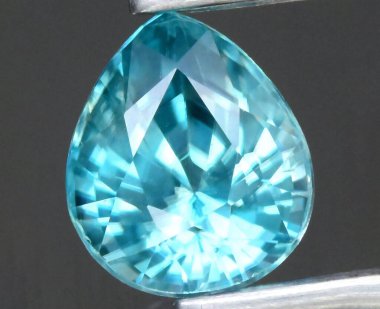 Exquisite Pear-Shaped Natural Aquamarine Gemstone Reflecting Intricate Cuts and Radiant Clarity. clipart