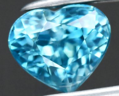 Exquisite Heart-Shaped Natural Blue Topaz Gemstone with Impeccable Clarity and Cut. clipart