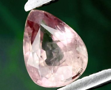 Exquisite Pear-Shaped Pink Morganite Gemstone Captured with Precision. clipart